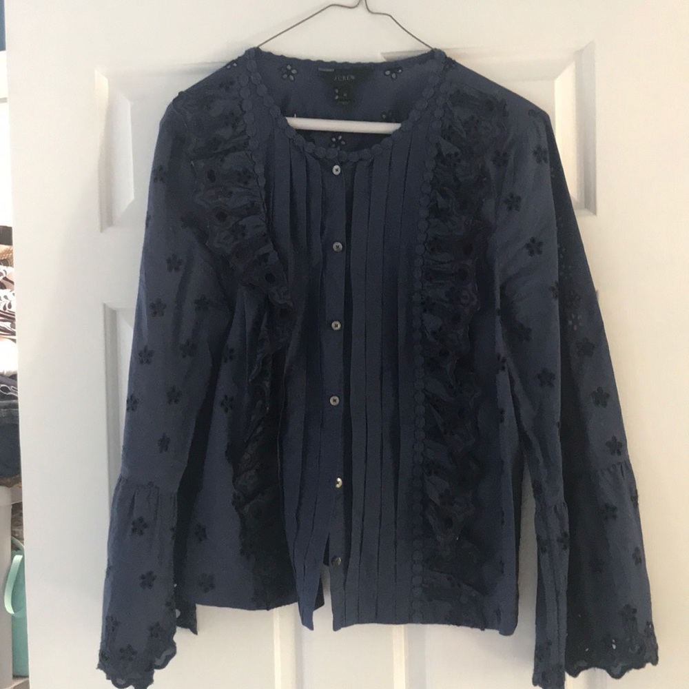 Eyelet blouse.